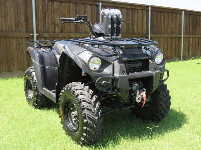 Kawasaki Brute Force ready for trail riding with a snorkel kit, winch, and upgraded tires.